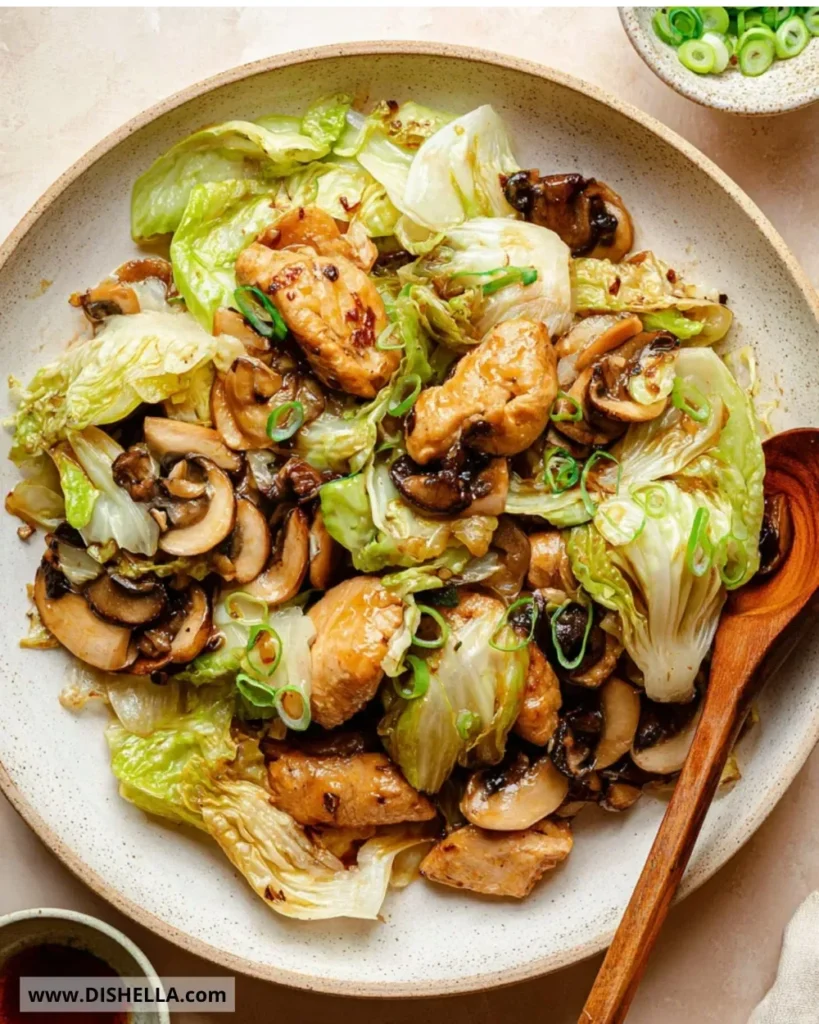 Chinese chicken cabbage stir-fry with colorful vegetables in a bowl