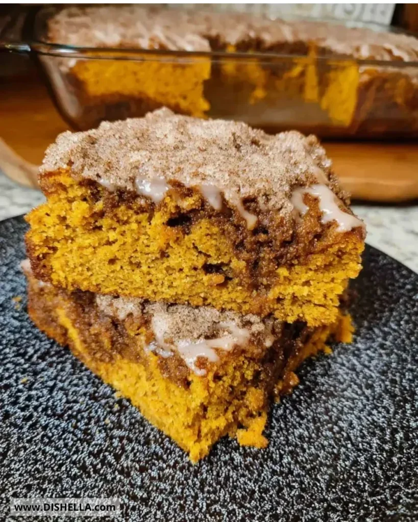 Sourdough pumpkin coffee cake slice on a rustic wooden table