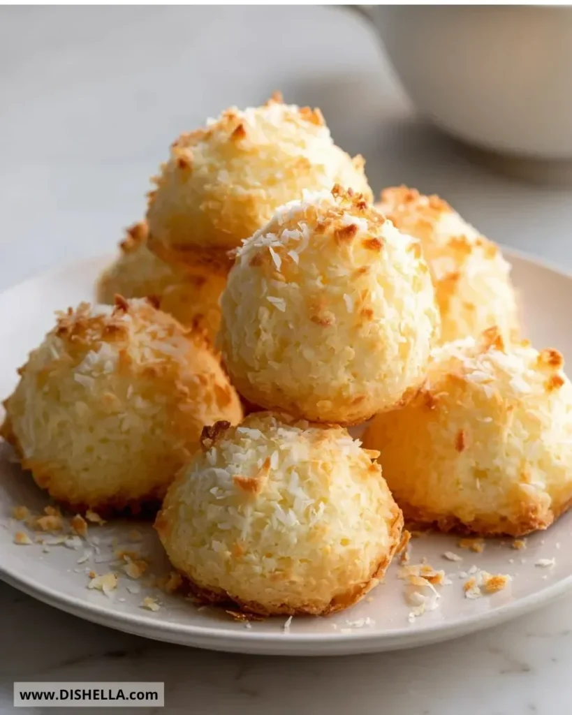 Delicious Portuguese Coconut Cakes topped with fresh coconut flakes