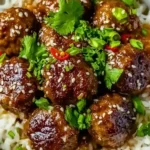 Delicious meatballs and rice bowl, perfectly seasoned and garnished.