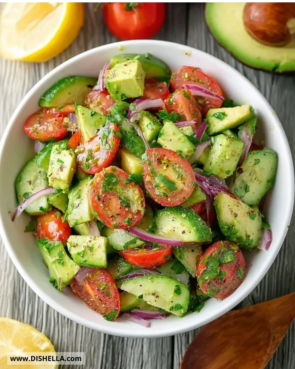 Delicious cucumber tomato avocado salad in a bowl