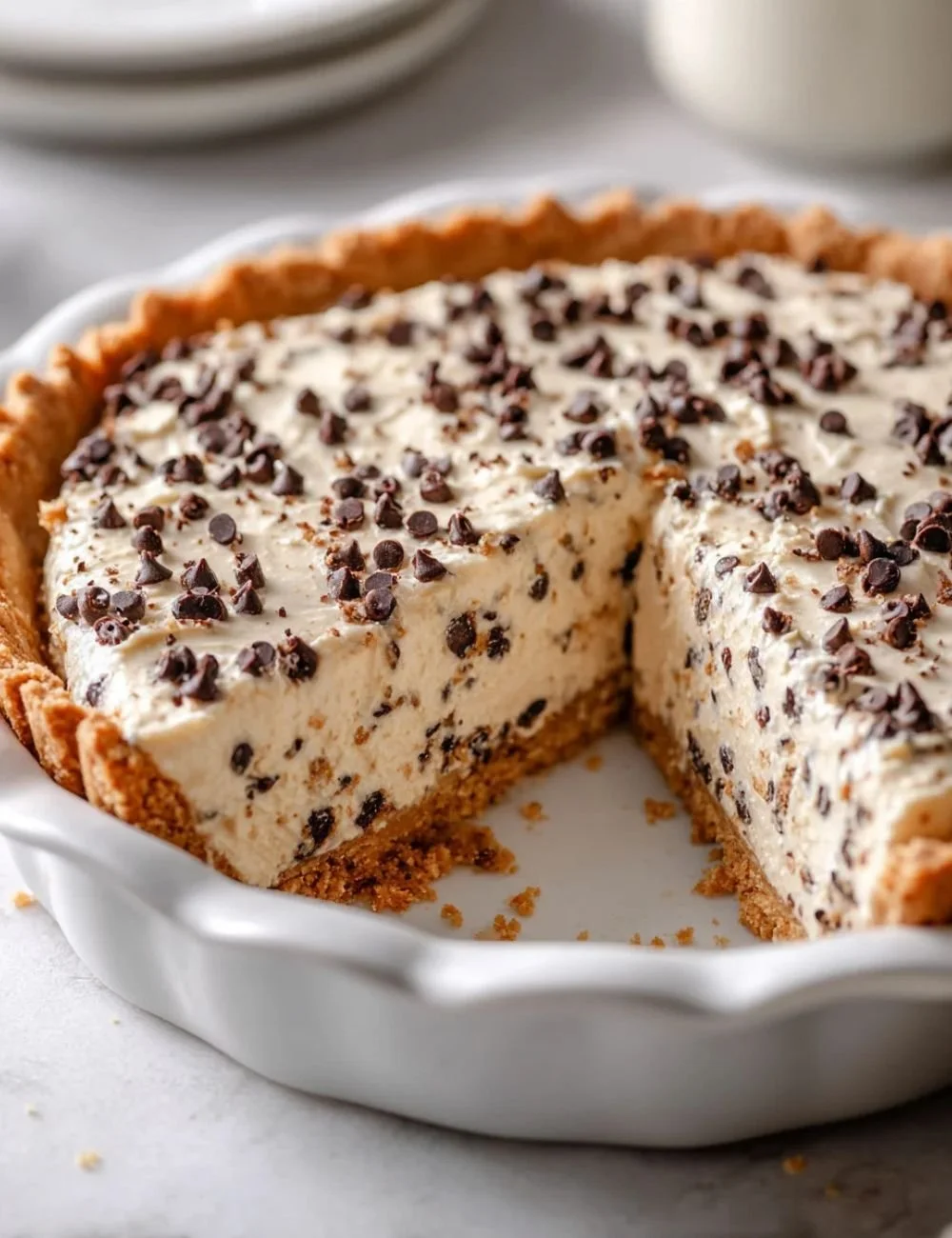 Delicious Chocolate Chip Cannoli Pie with chocolate chips and creamy filling