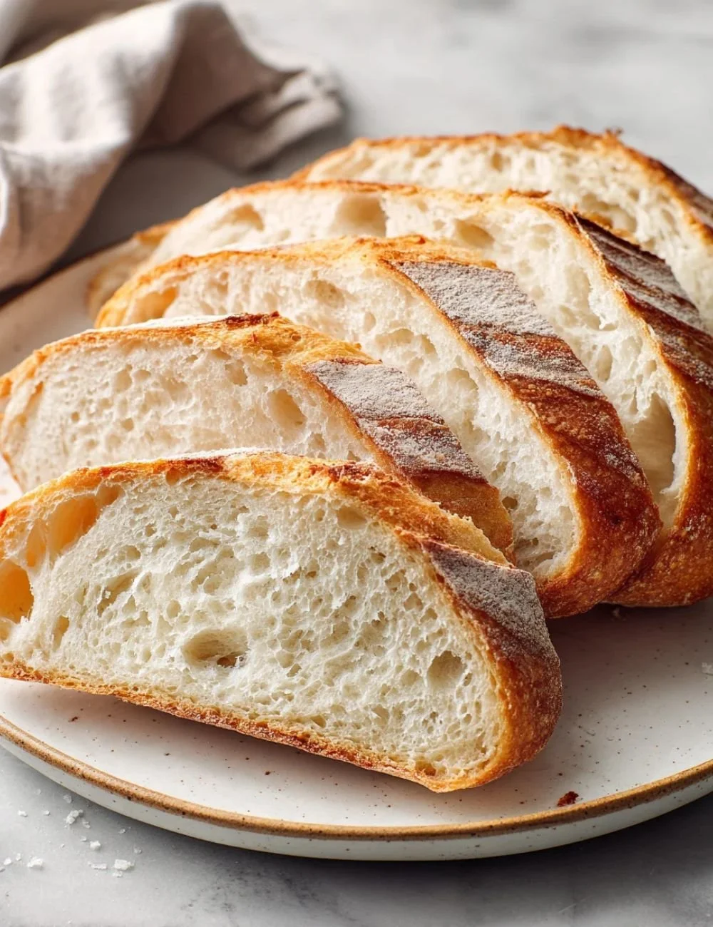 Freshly baked artisan bread showcasing the crusty exterior and soft interior.