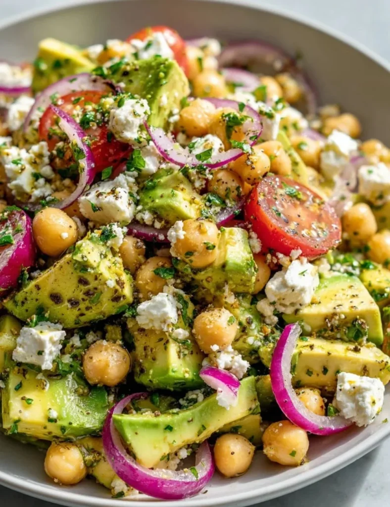Chickpea Feta Avocado Salad with fresh greens and vibrant vegetables