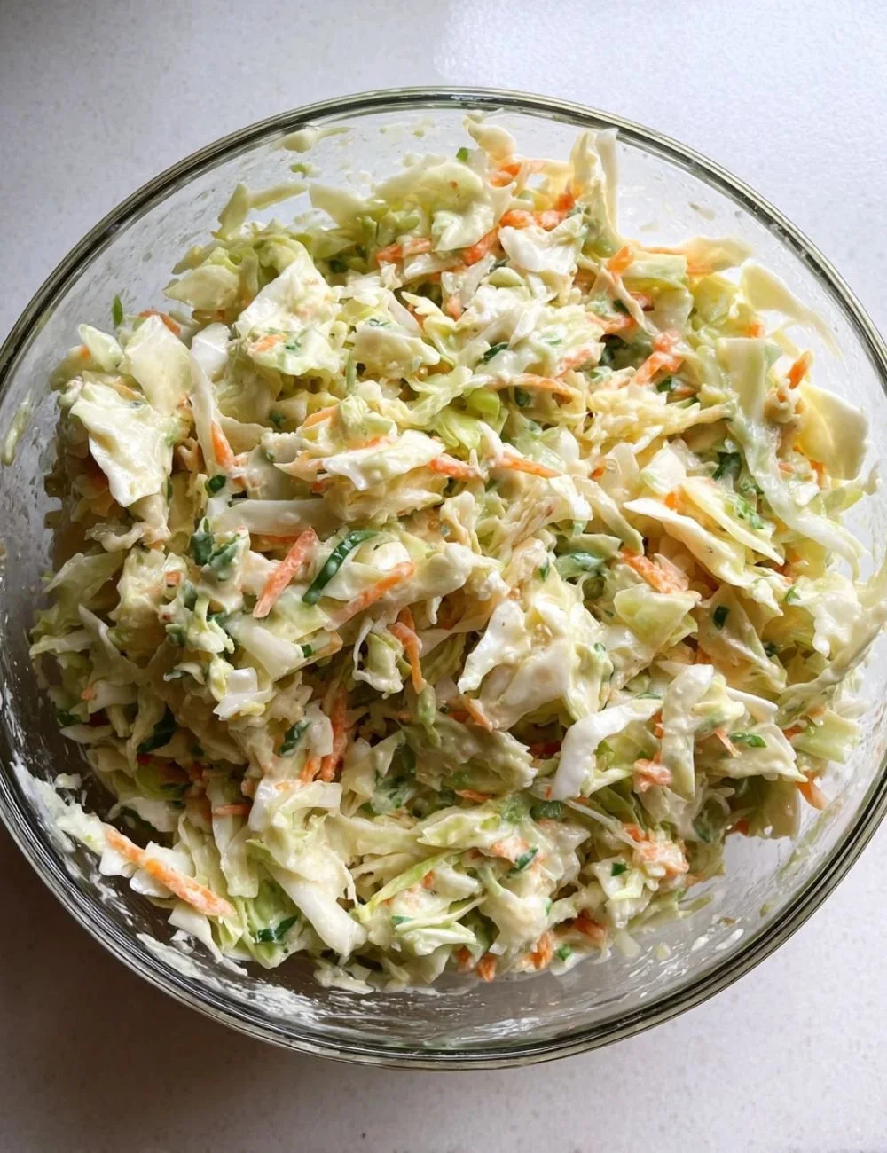Freshly made Savoy Cabbage Salad with vibrant vegetables and dressing