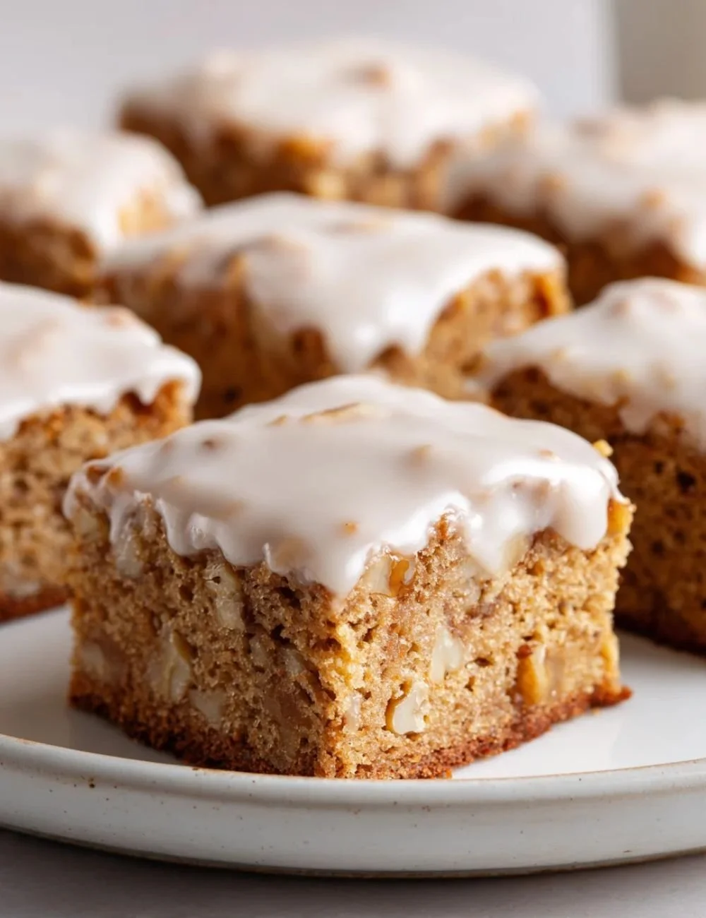Delicious banana bread brownies topped with nuts and chocolate chips