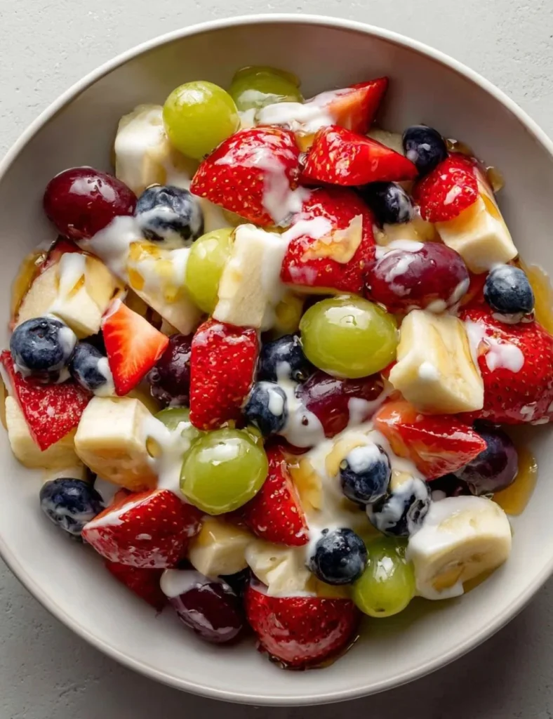 Colorful breakfast fruit salad with a variety of fresh fruits
