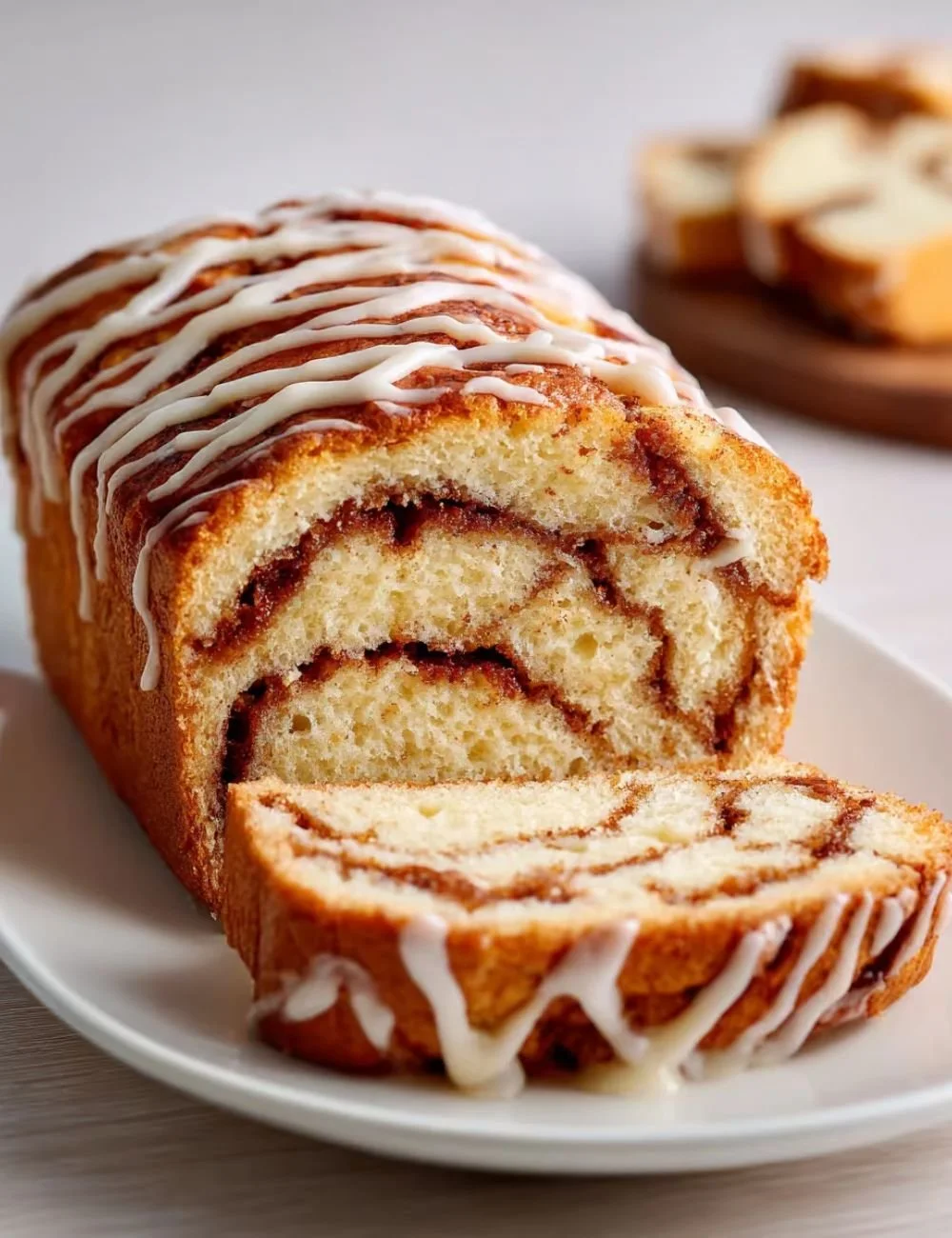 Delicious high protein cottage cheese cinnamon roll topped with icing