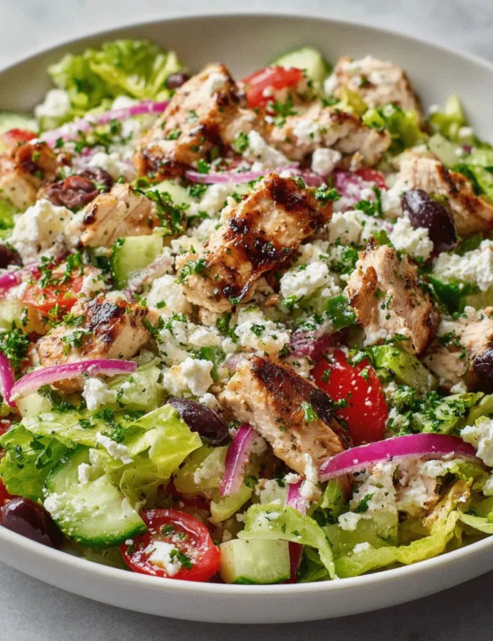 Hearty Mediterranean Chicken Salad with chopped vegetables and grilled chicken