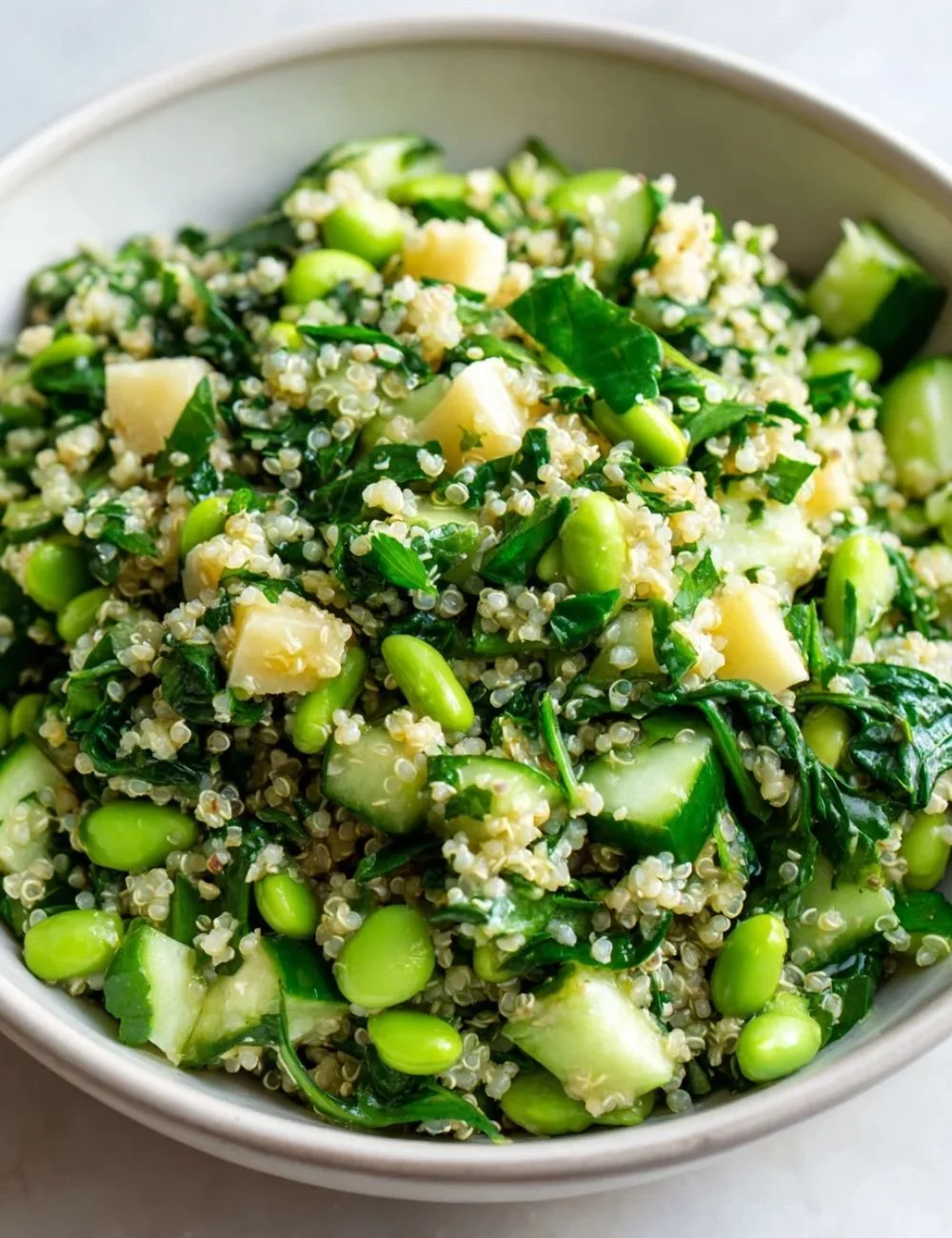 Delicious salad topped with homemade Asian dressing, fresh vegetables, and vibrant colors.