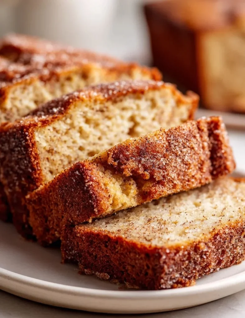 Freshly baked snickerdoodle banana bread with cinnamon sugar topping