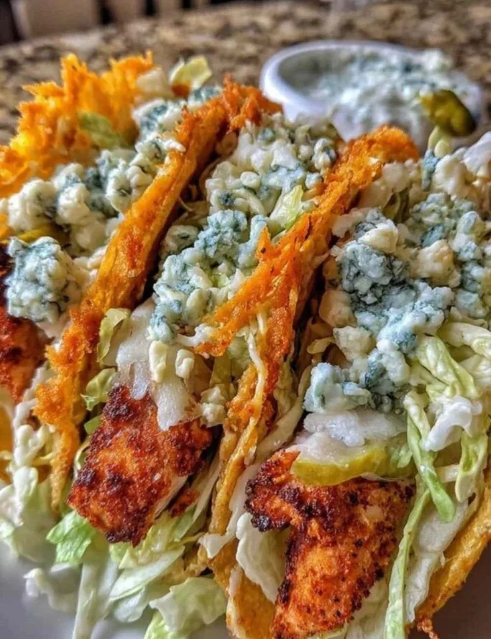Dill Pickle Ranch Smash Chicken Tacos with Crispy Cheese Lace on a plate