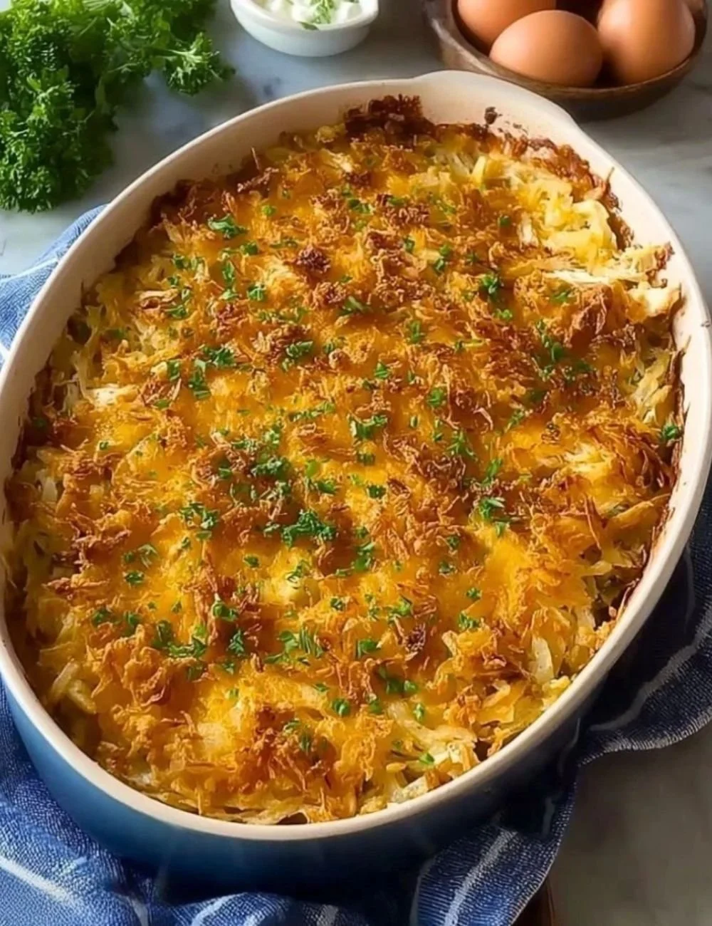 Delicious Rotisserie Chicken Hash Brown Casserole with cheese and crispy toppings