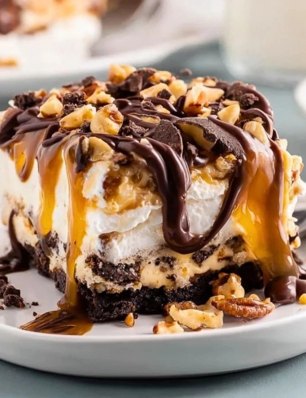 No-bake turtle lasagna dessert with caramel and chocolate layers